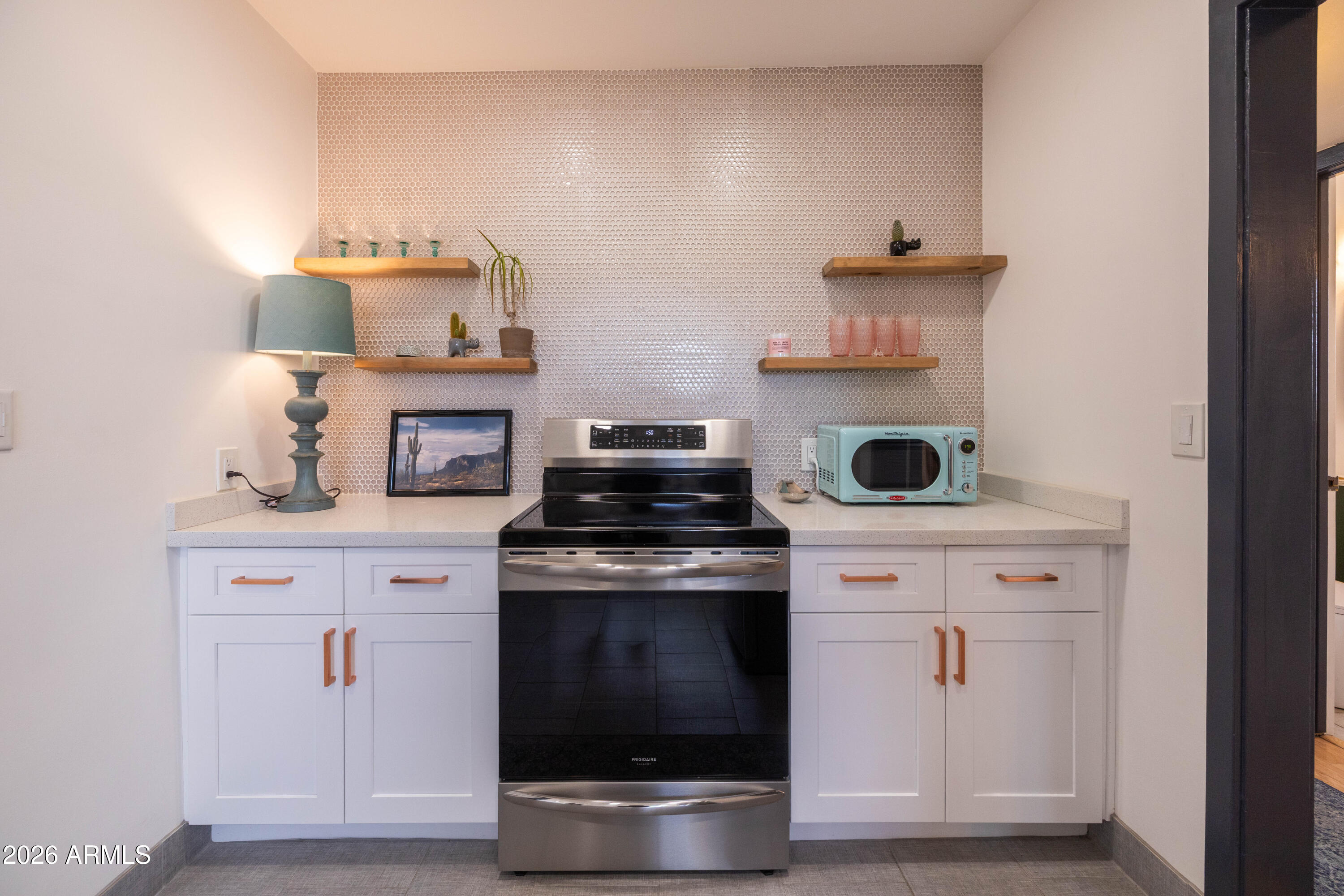 1222 East Almeria Road Phoenix, AZ 85006 - Photo 24 of 55 a white stove top oven sitting inside of a kitchen