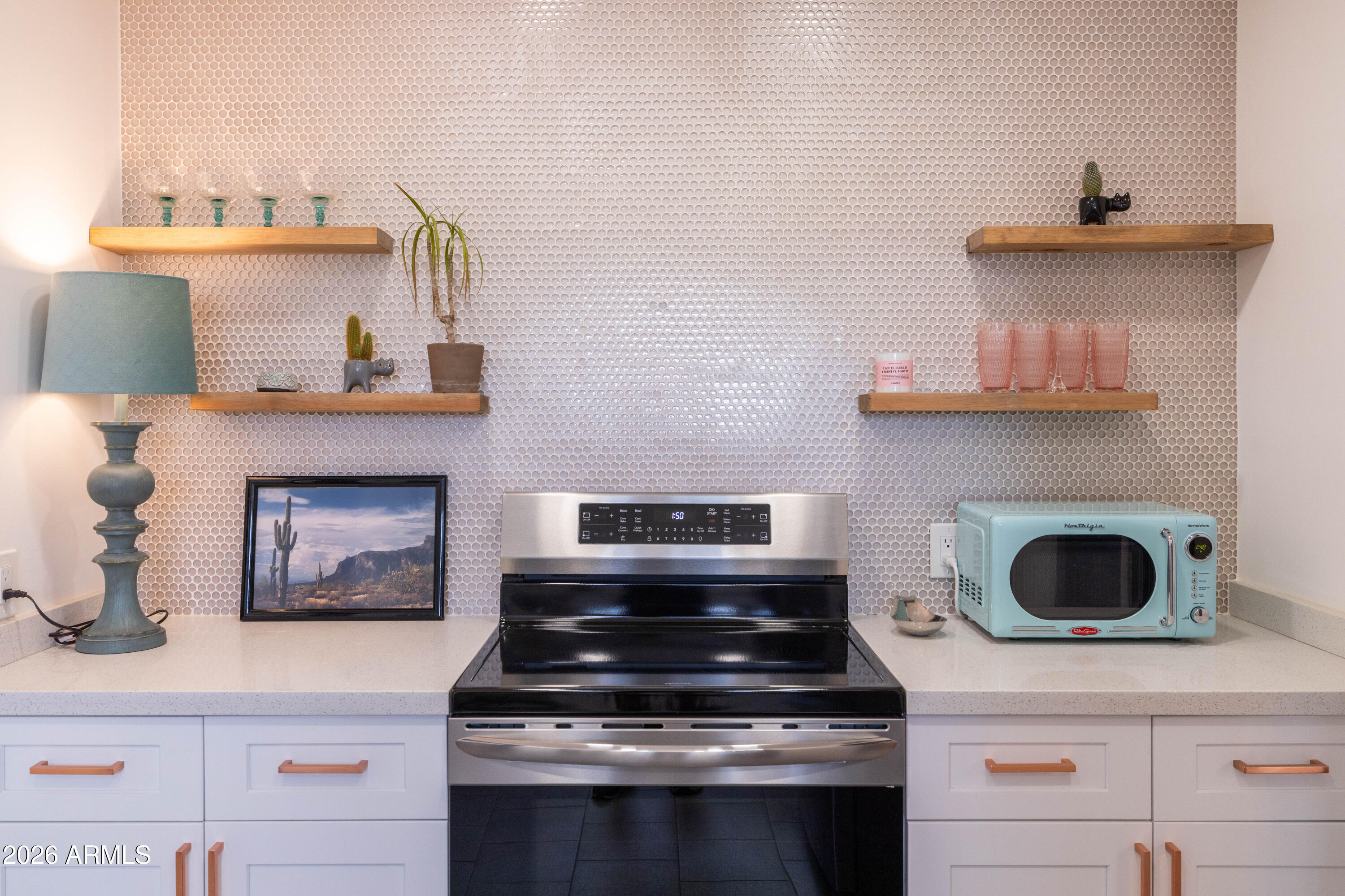1222 East Almeria Road Phoenix, AZ 85006 - Photo 25 of 55 a stove top oven sitting inside of a kitchen