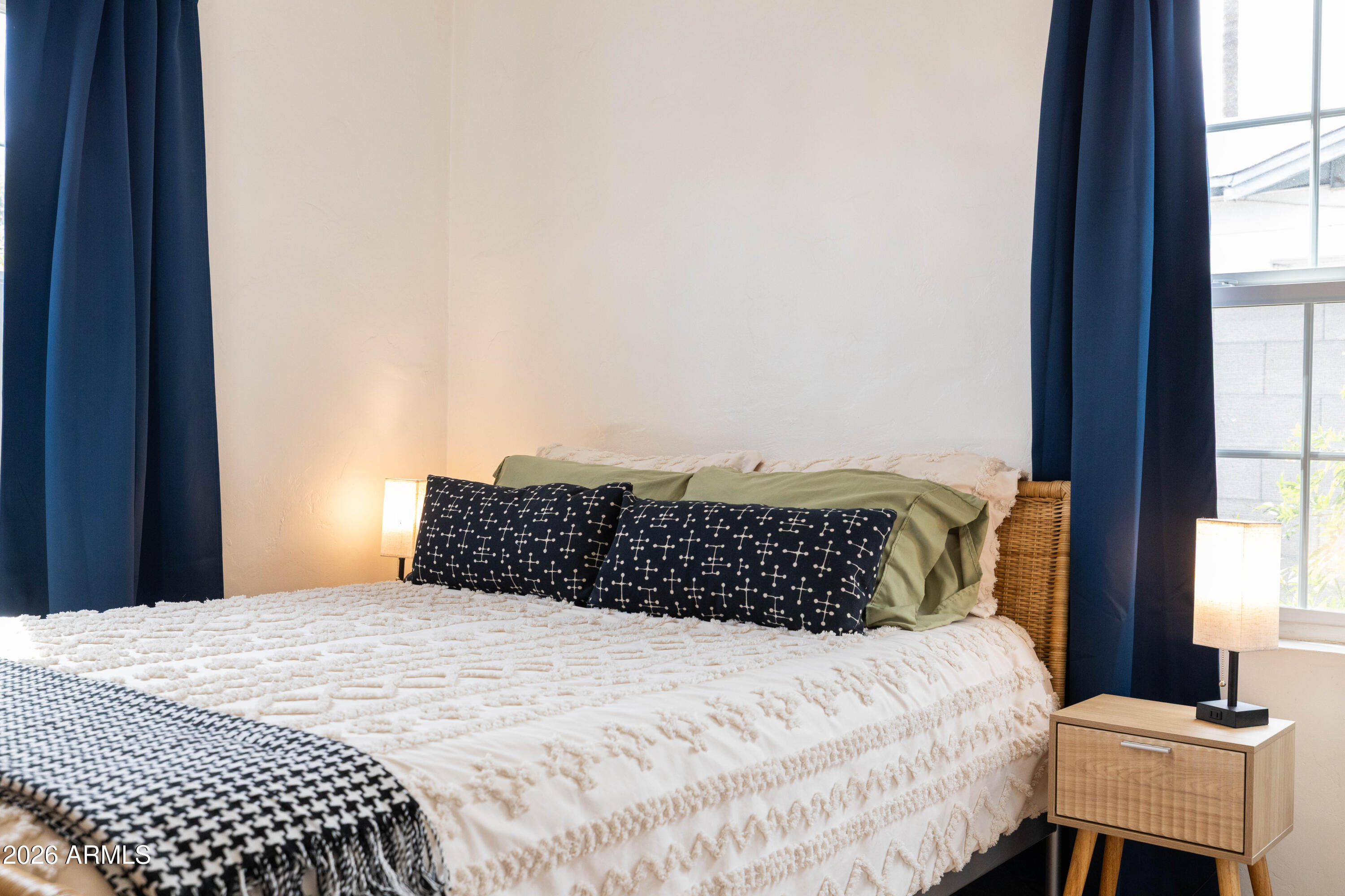 1222 East Almeria Road Phoenix, AZ 85006 - Photo 29 of 55 a bedroom with a bed and window