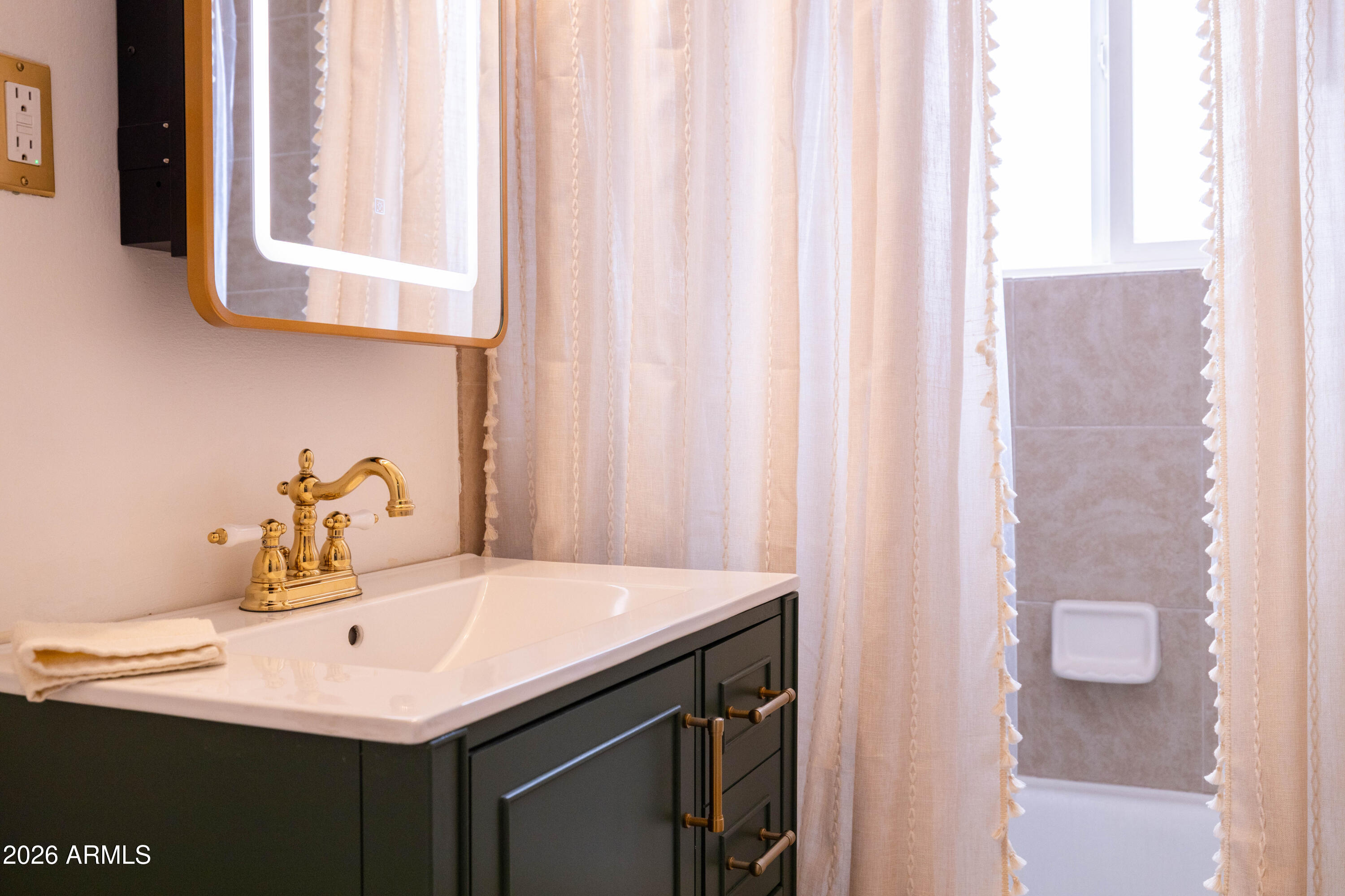 1222 East Almeria Road Phoenix, AZ 85006 - Photo 33 of 55 a bathroom with a sink and a mirror