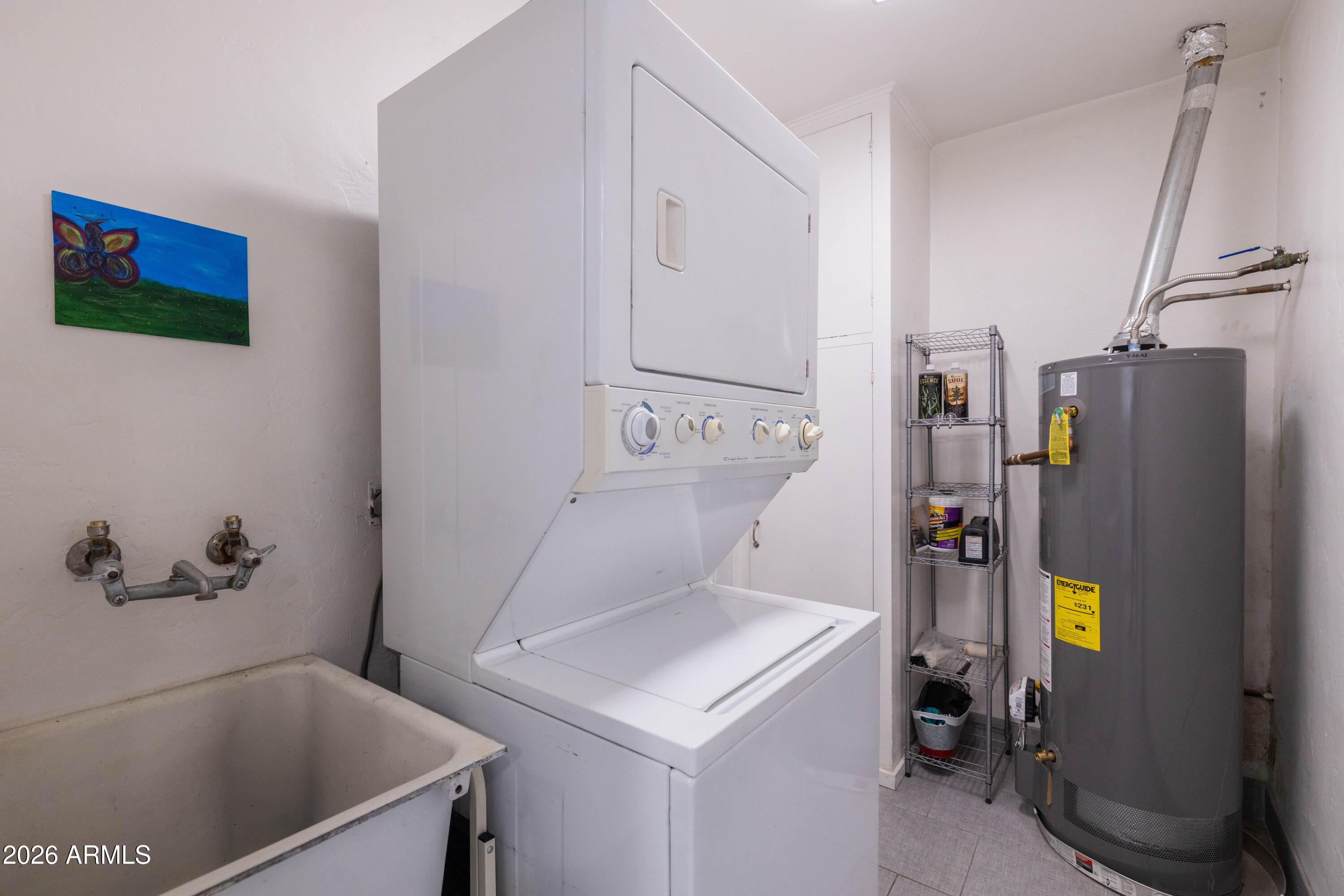 1222 East Almeria Road Phoenix, AZ 85006 - Photo 36 of 55 a bathroom with a sink and washing machine