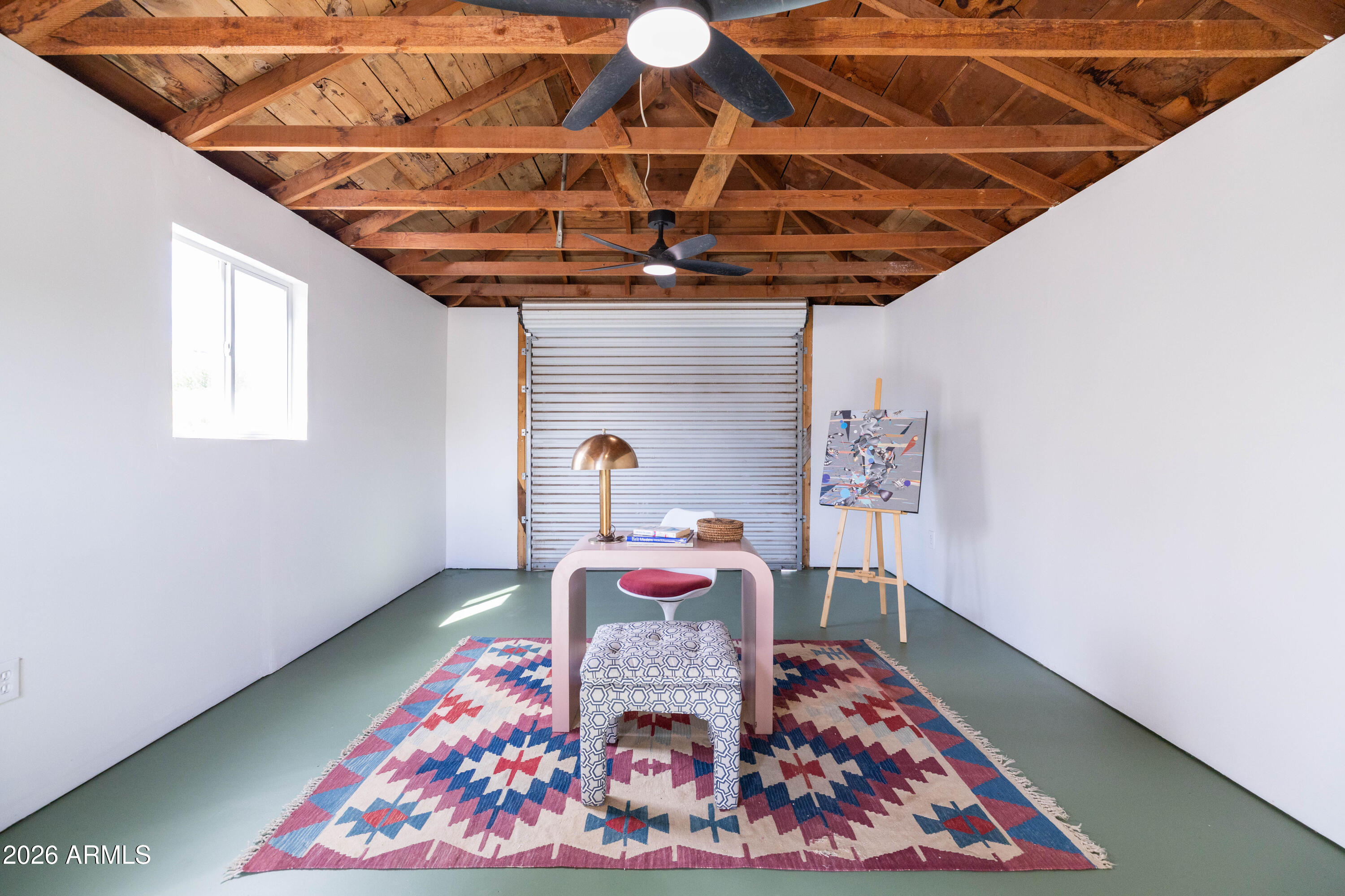 1222 East Almeria Road Phoenix, AZ 85006 - Photo 50 of 55 a bedroom with a bed and wooden floor