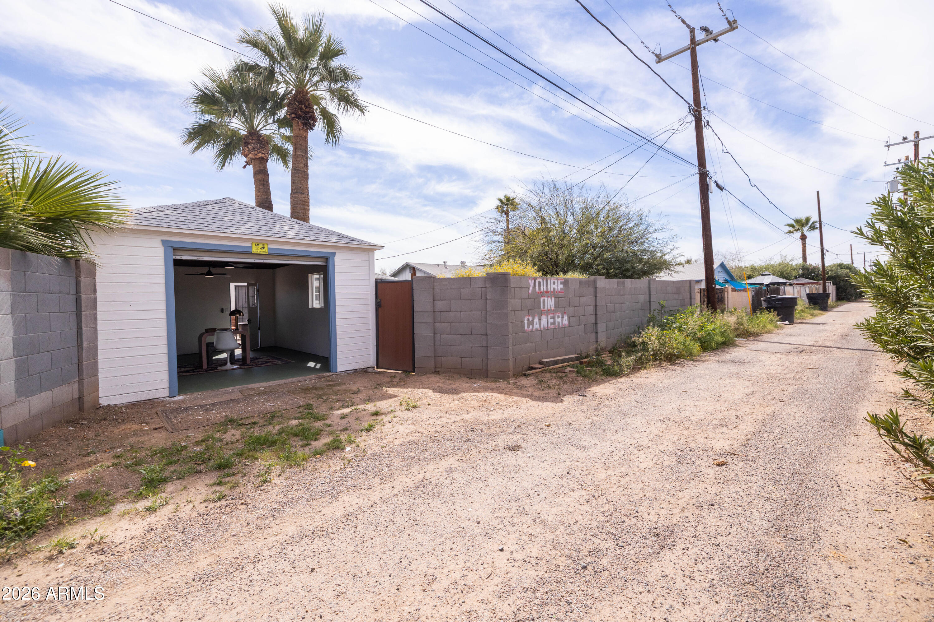 1222 East Almeria Road Phoenix, AZ 85006 - Photo 51 of 55 a front view of a house with a yard and garage