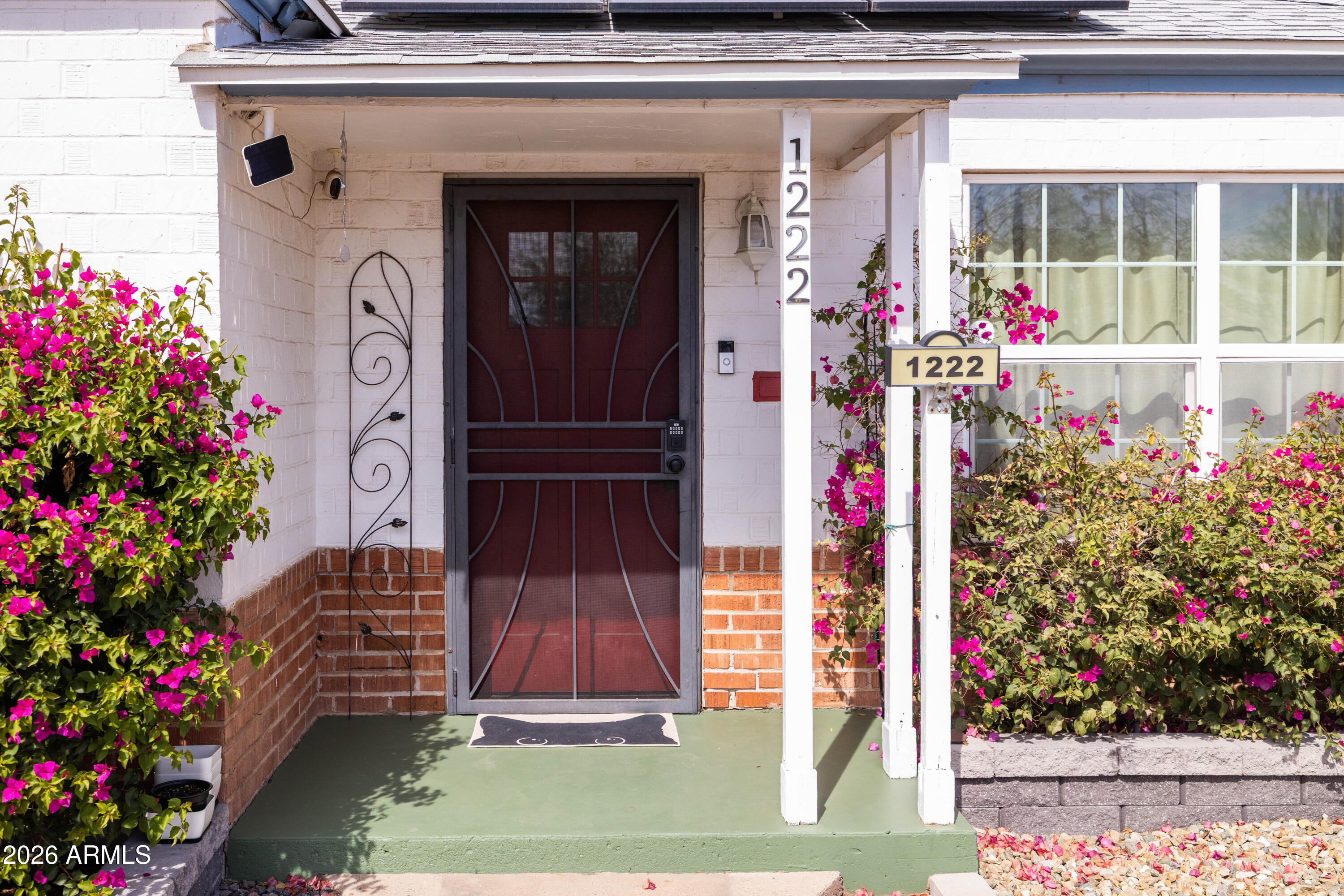 1222 East Almeria Road Phoenix, AZ 85006 - Photo 6 of 55 a front view of a house with a yard