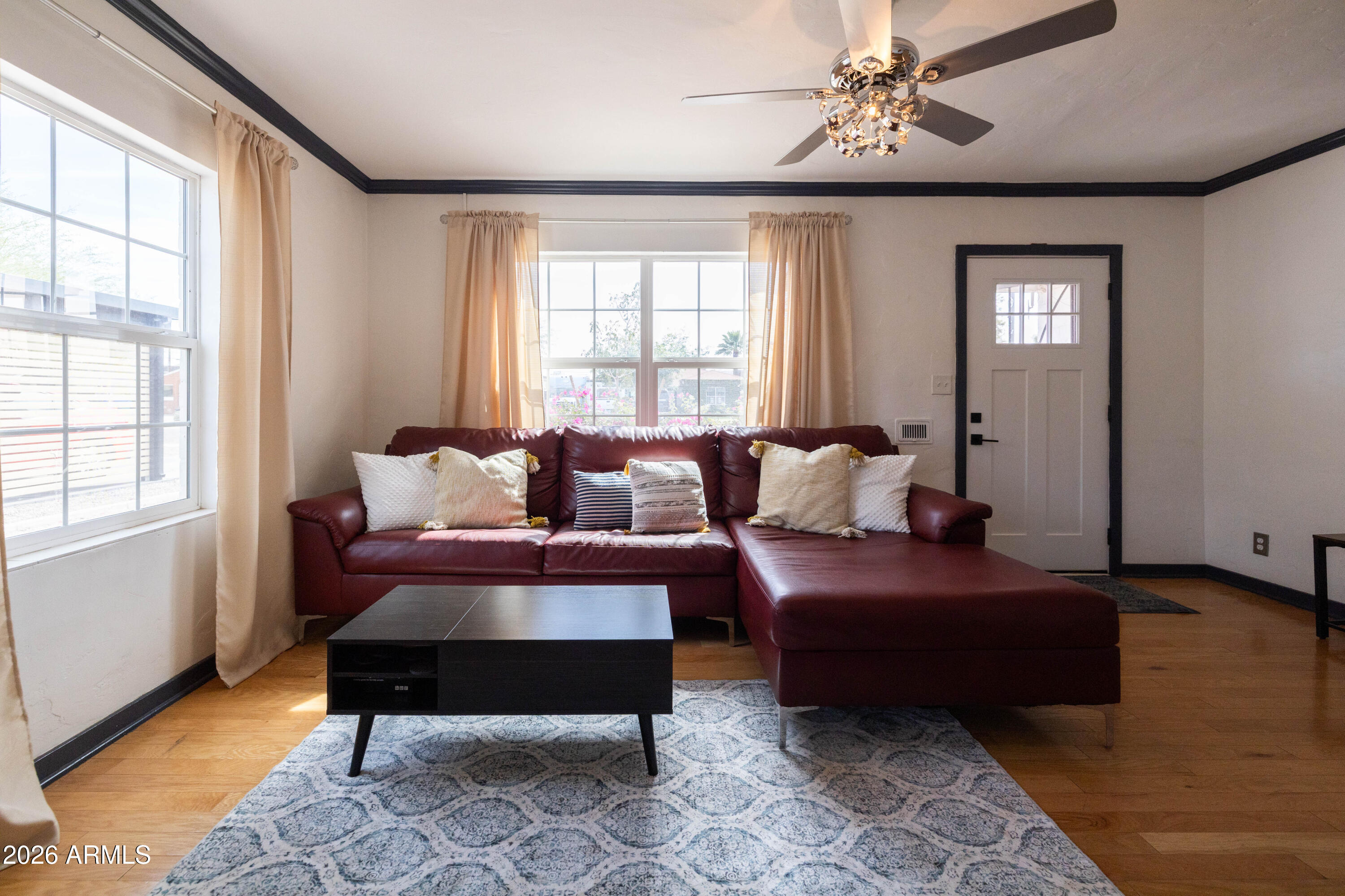 1222 East Almeria Road Phoenix, AZ 85006 - Photo 8 of 55 a living room with furniture and a window