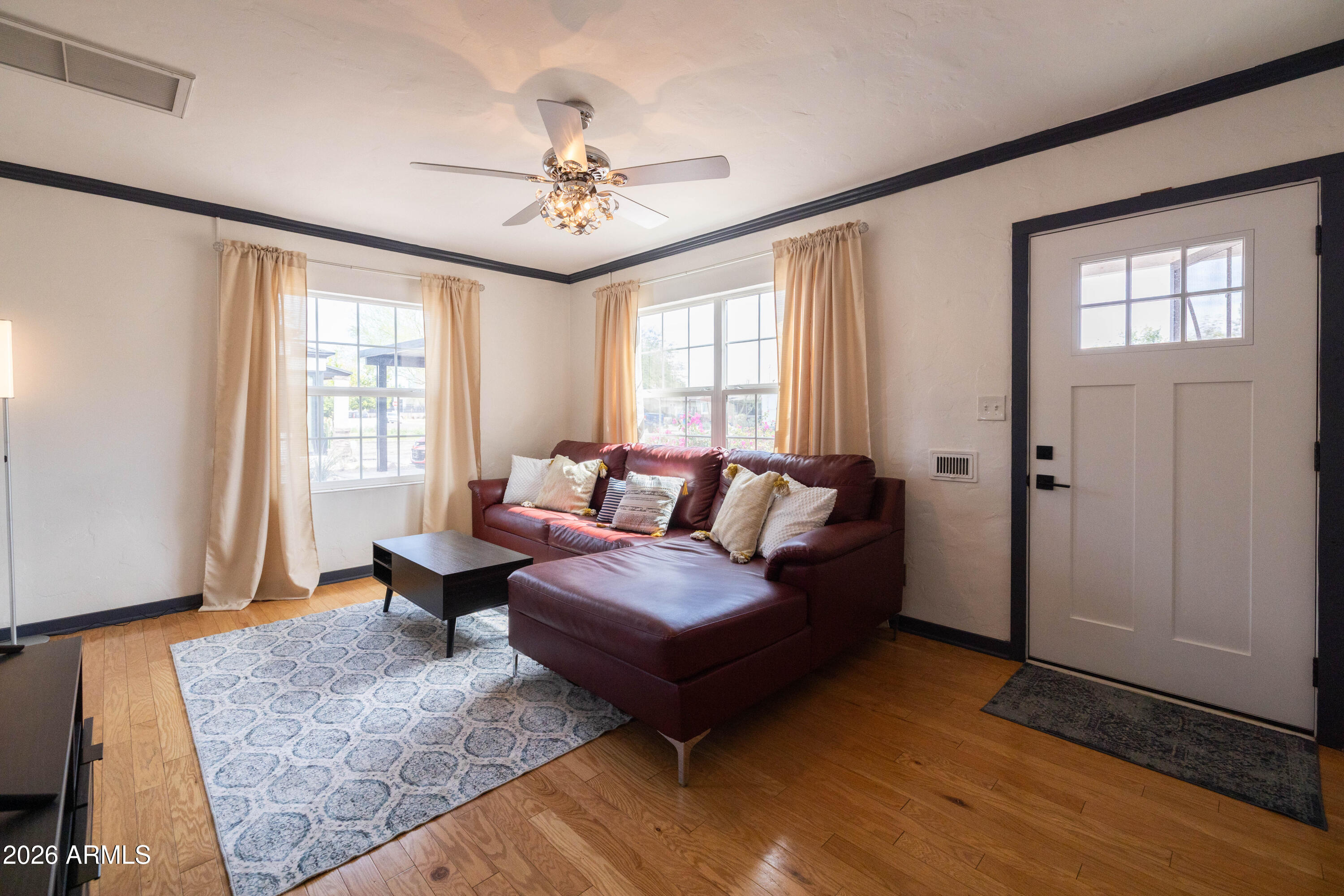 1222 East Almeria Road Phoenix, AZ 85006 - Photo 9 of 55 a living room with furniture and wooden floor