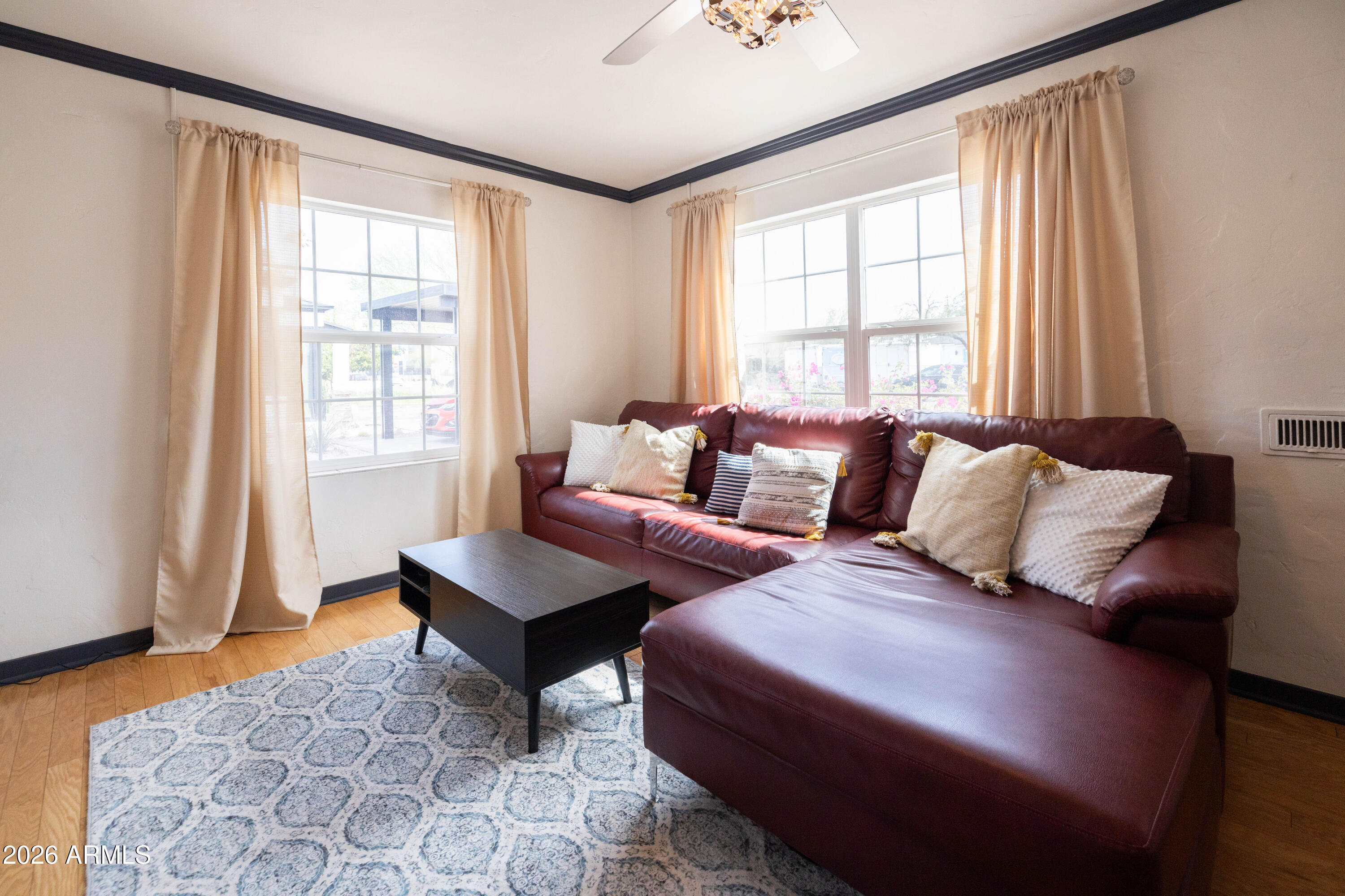 1222 East Almeria Road Phoenix, AZ 85006 - Photo 10 of 55 a bedroom with furniture and a window