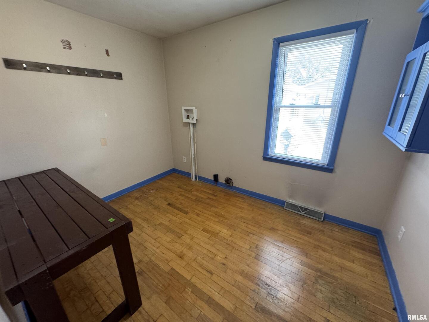 7 Holly Lane Flora, IL 62839 - Photo 32 of 42 a view of a room with wooden floor and windows