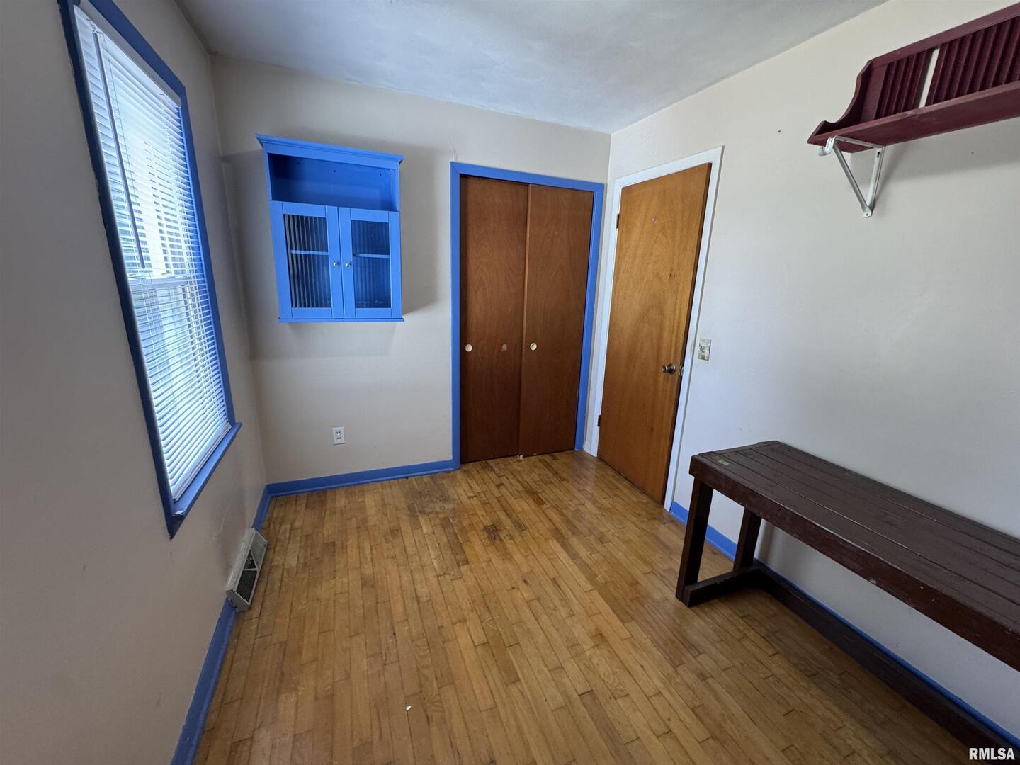 7 Holly Lane Flora, IL 62839 - Photo 33 of 42 a view of a room with wooden floor and stairs