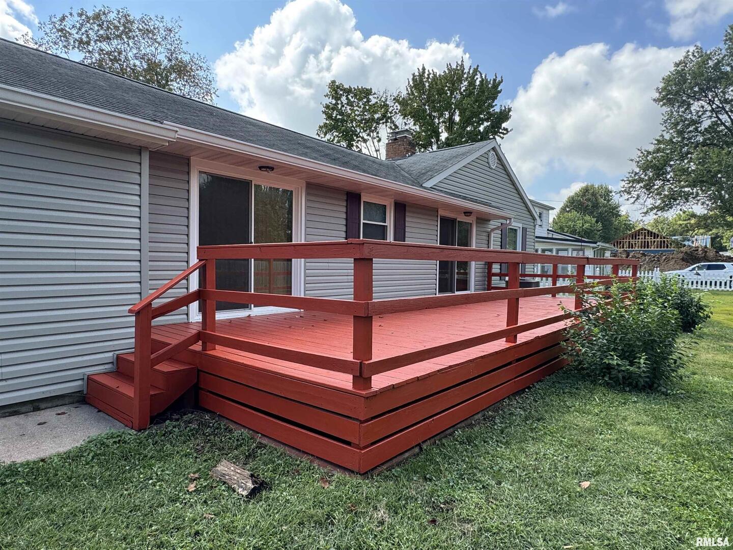 7 Holly Lane Flora, IL 62839 - Photo 38 of 42 a view of a house with a backyard