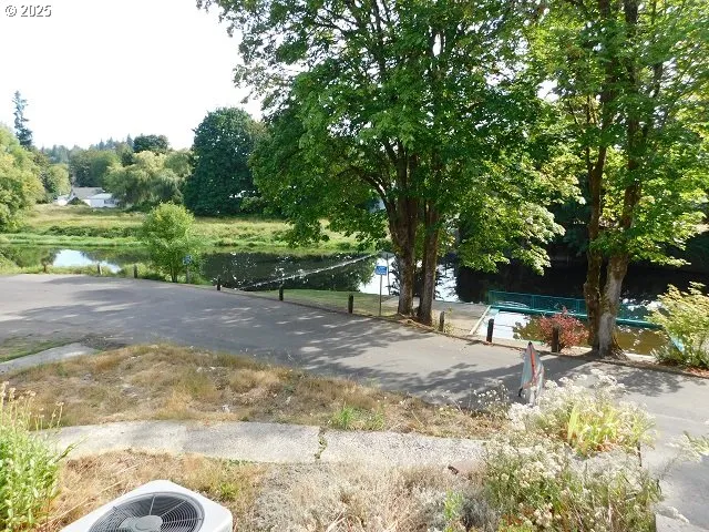 a view of outdoor space with deck and tree