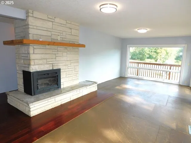 a view of livingroom with furniture and fireplace