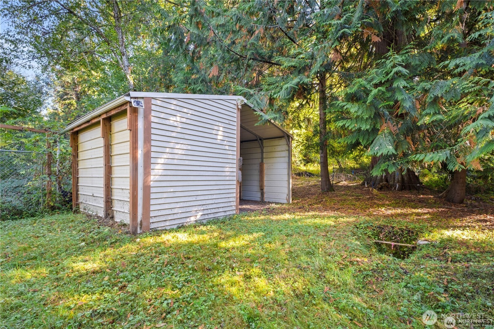 14310 200th Avenue Southeast Renton, WA 98058 - Photo 23 of 39 a view of a back yard of the house