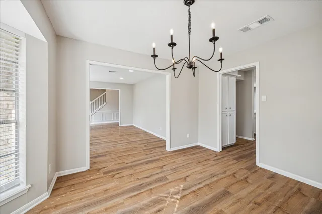 a view interior of a house with wooden floor windows