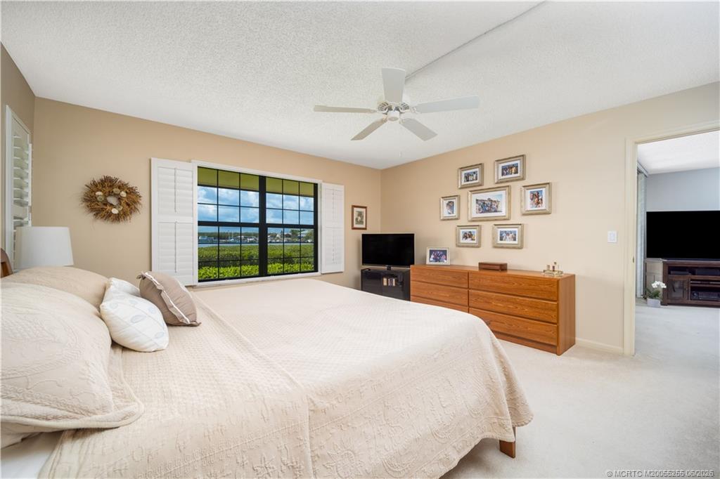 3100 Southeast Pruitt Road, Unit F101 Port St. Lucie, FL 34952 - Photo 20 of 37 Waterfront view from AM to PM