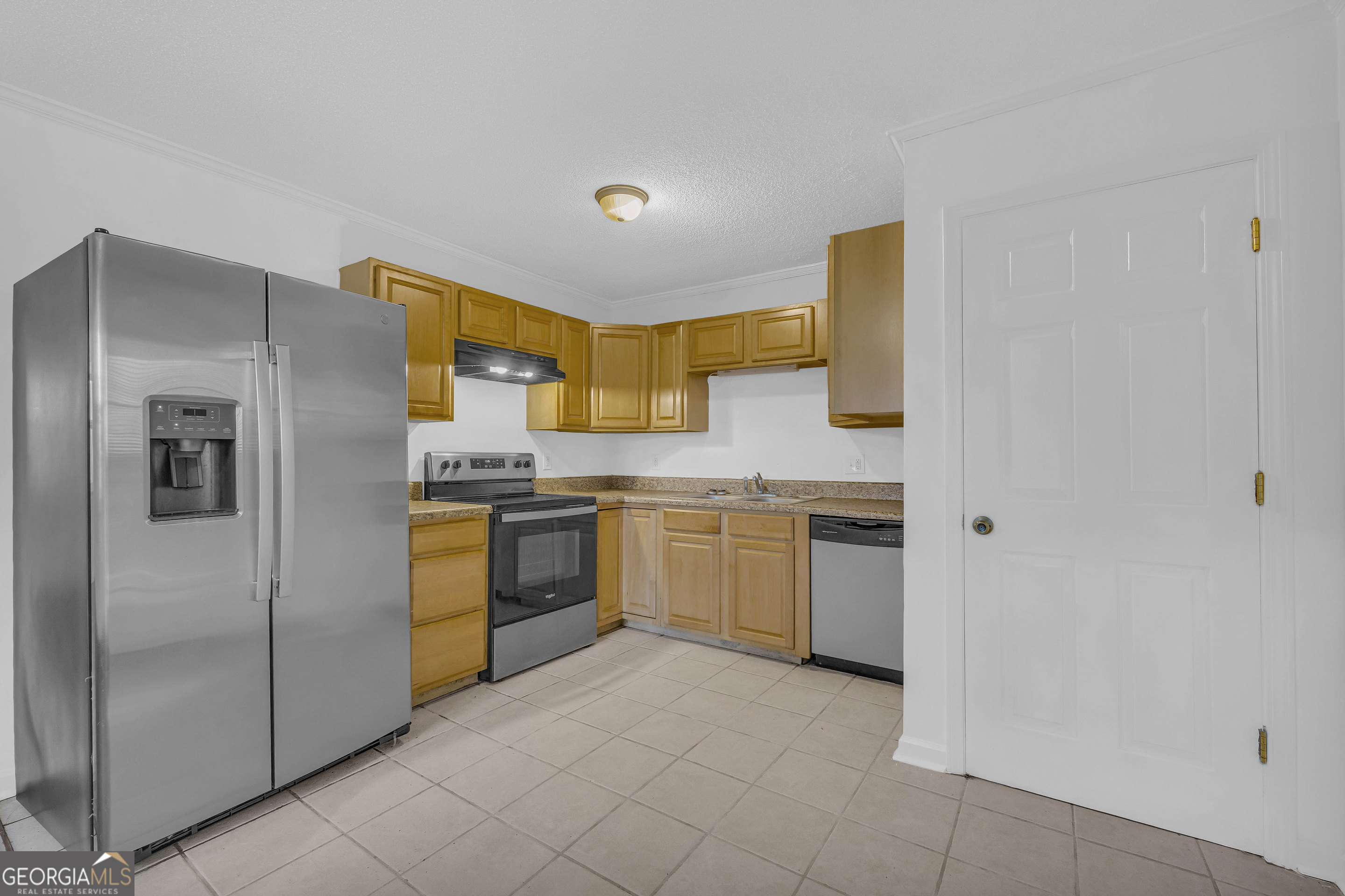260 Pettit Lane Athens, GA 30605 - Photo 13 of 65 a kitchen with a sink and stainless steel appliances
