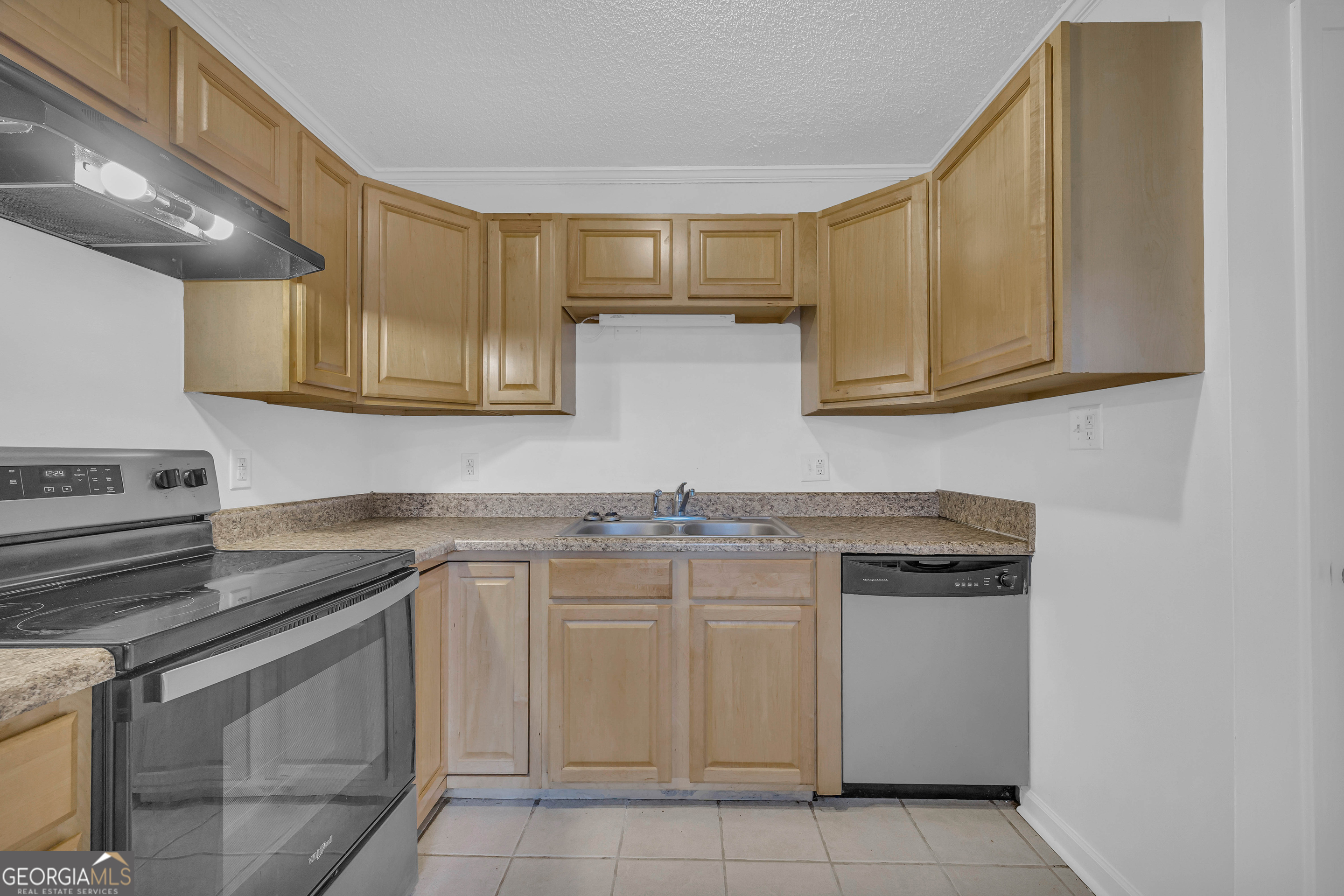 260 Pettit Lane Athens, GA 30605 - Photo 15 of 65 a kitchen with cabinets appliances and a sink