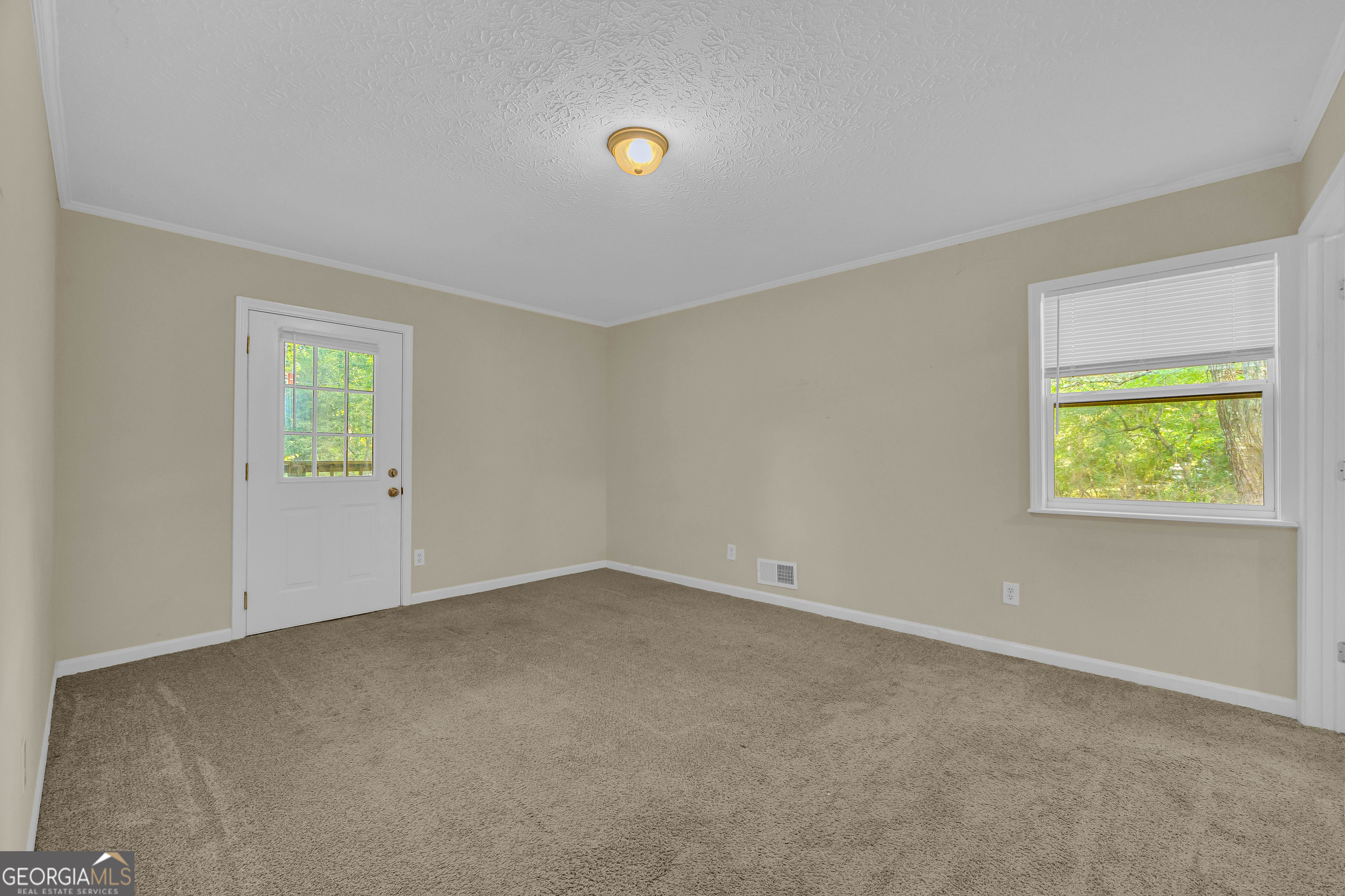 260 Pettit Lane Athens, GA 30605 - Photo 17 of 65 an empty room with windows