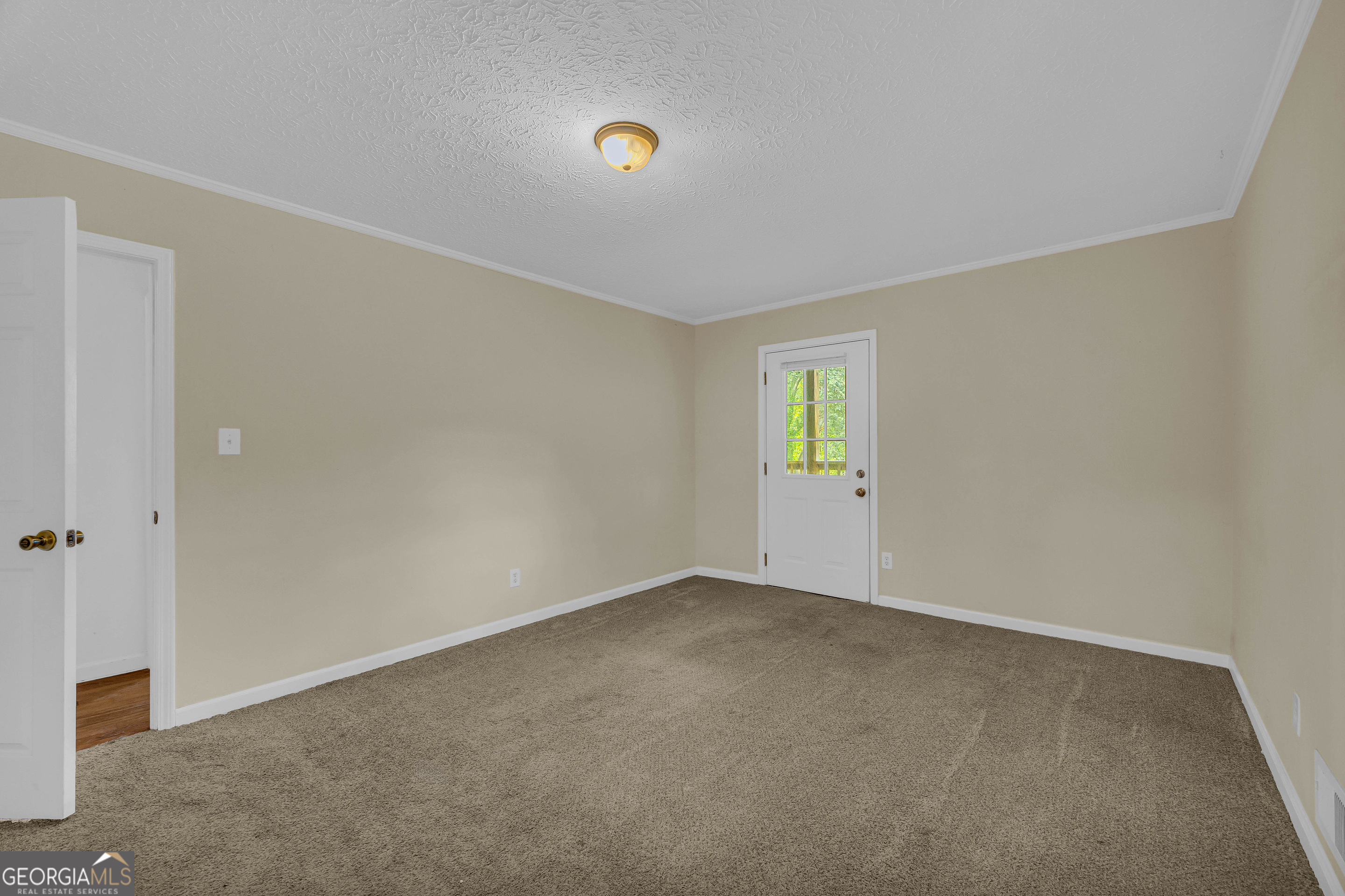 260 Pettit Lane Athens, GA 30605 - Photo 20 of 65 a view of an empty room with window