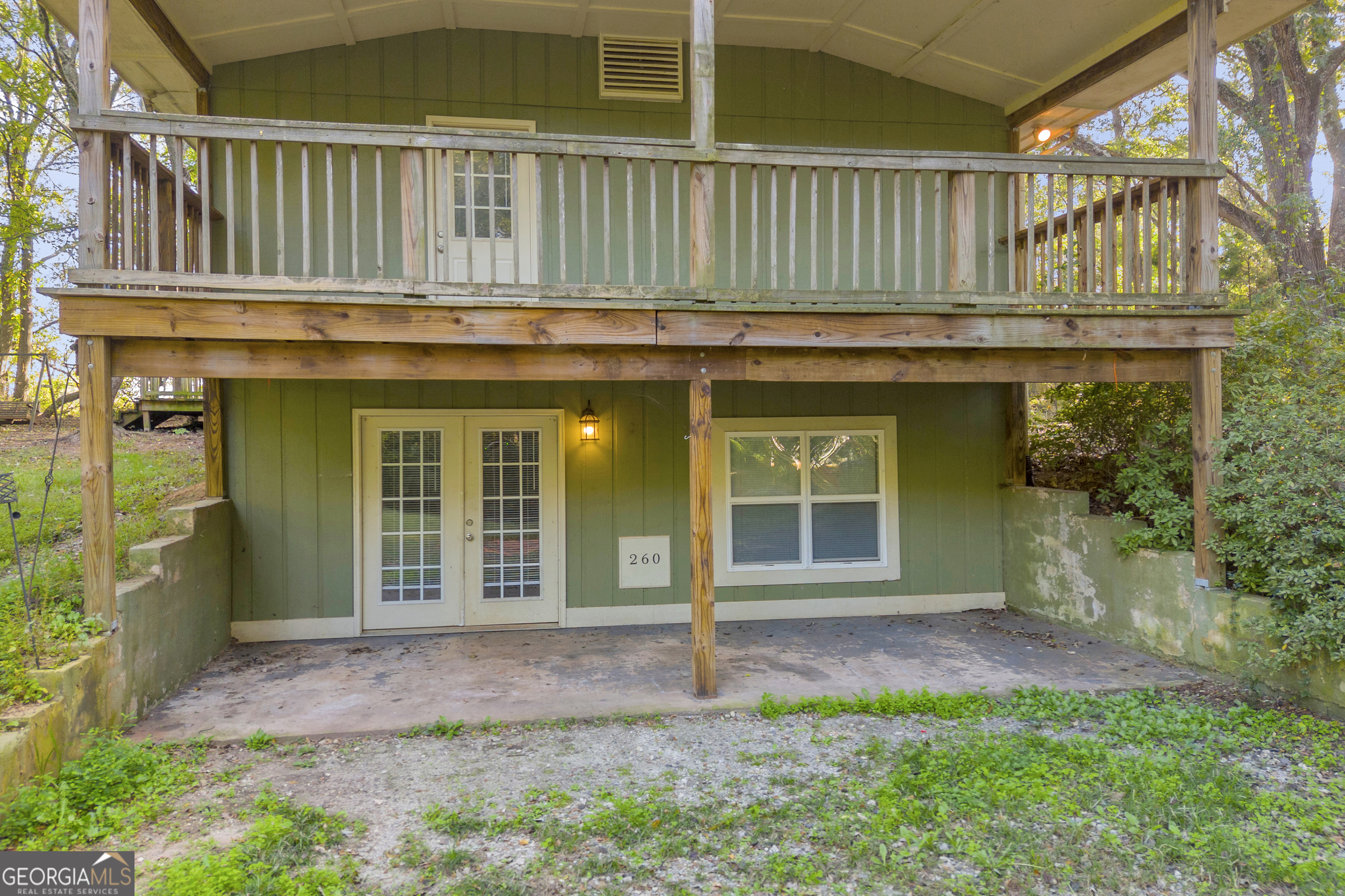 260 Pettit Lane Athens, GA 30605 - Photo 43 of 65 a view of a house with a small yard and wooden floor and fence