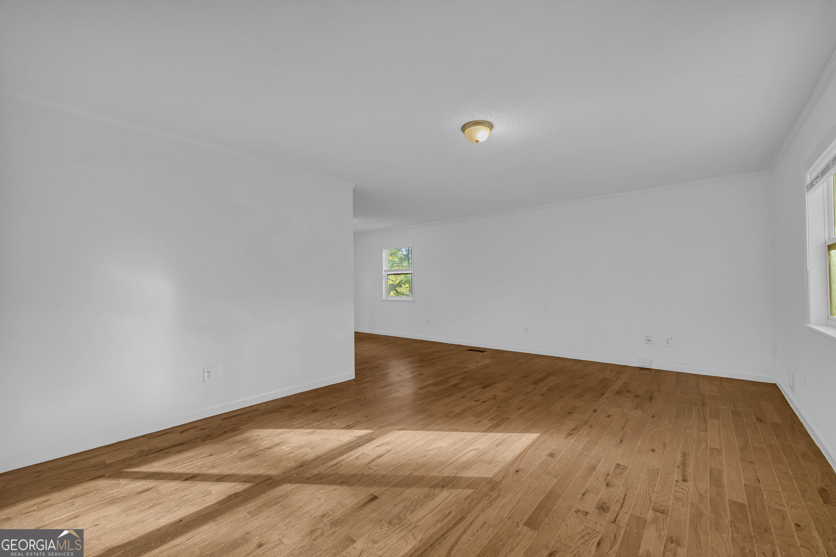 260 Pettit Lane Athens, GA 30605 - Photo 6 of 65 a view of an empty room with wooden floor