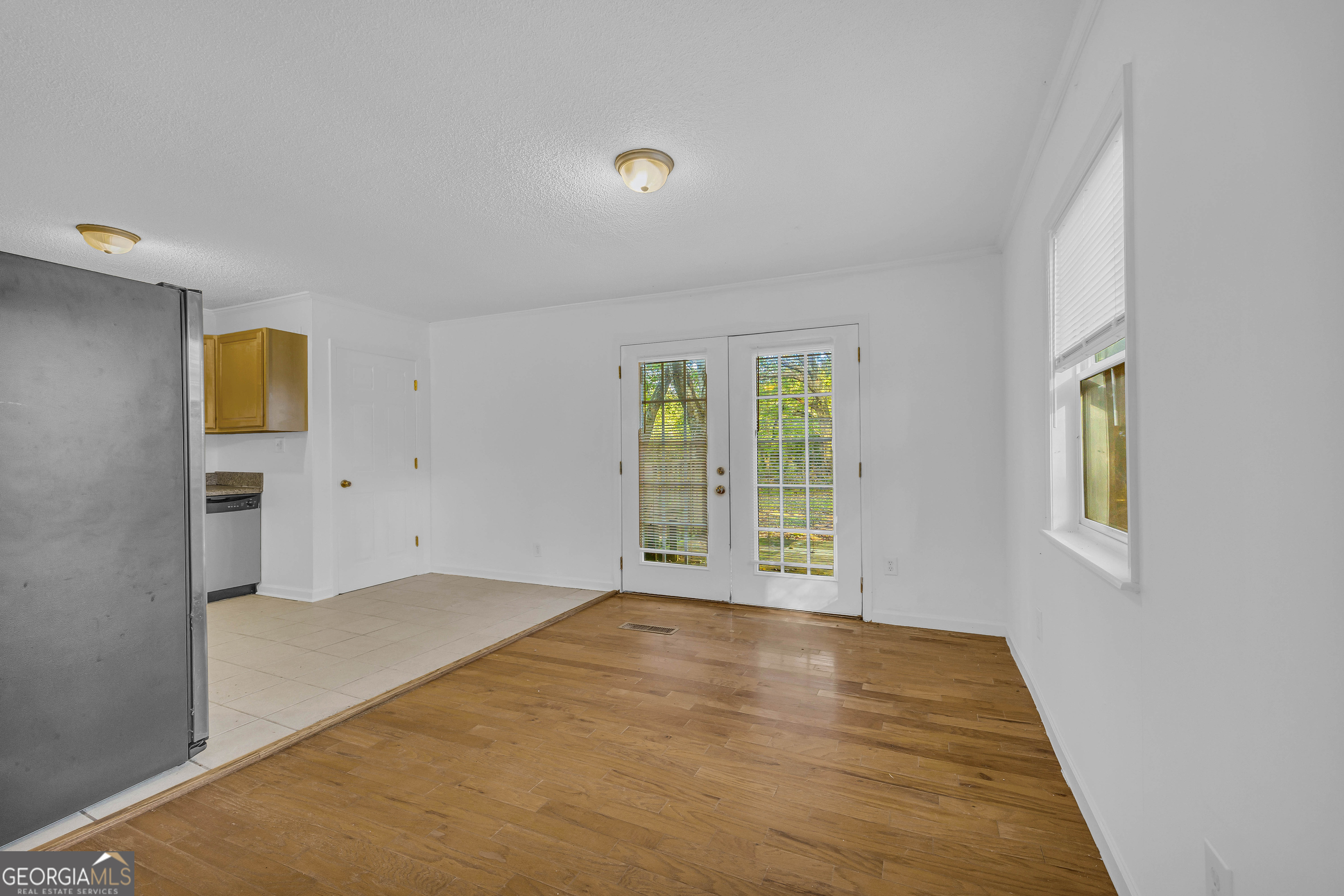 260 Pettit Lane Athens, GA 30605 - Photo 10 of 65 a view of an empty room with a window