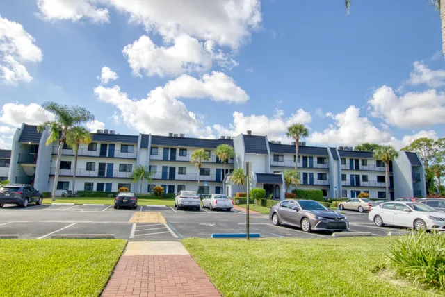 a cars parked in front of a building