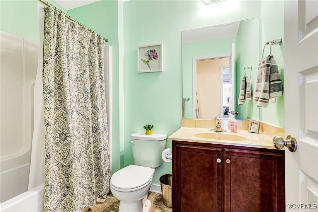 8061 Rutland Village Drive Mechanicsville, VA 23116 - Photo 19 of 22 Full bathroom with vanity, shower / bath combinati