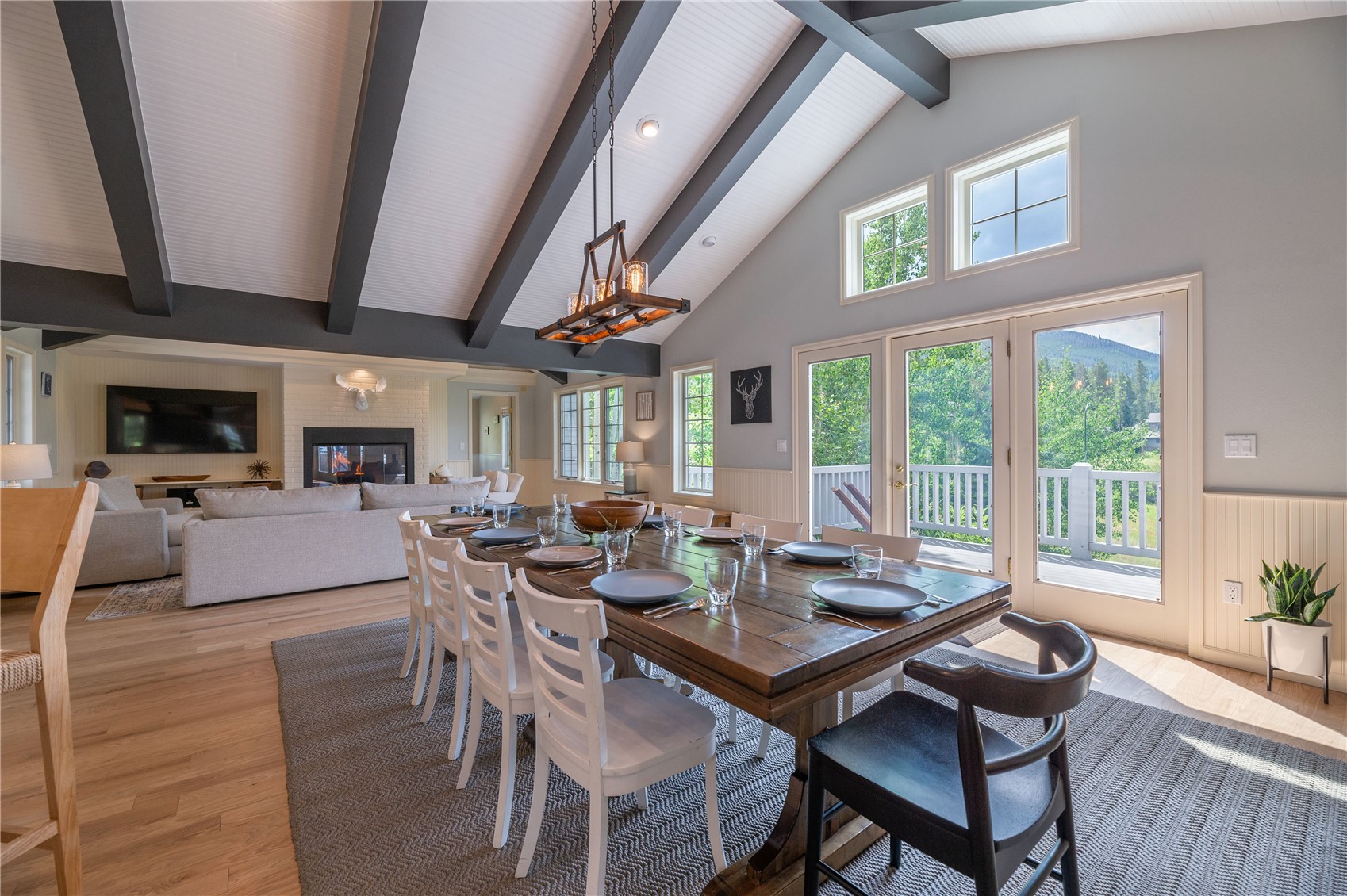 48 Keystone Ranch Golf Service Road Keystone, CO 80435 - Photo 12 of 49 Dining area opens to the large deck area for outdoor entertaining and grilling