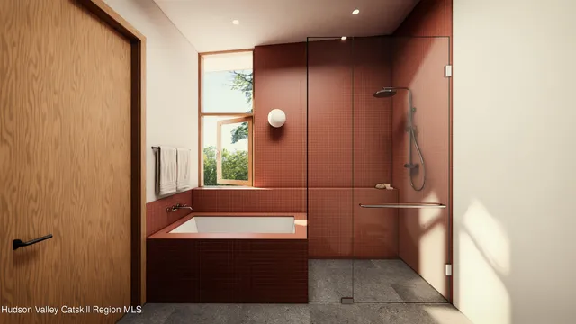 a bathroom with a sink and shower