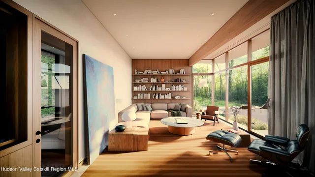 a living room with furniture and a floor to ceiling window