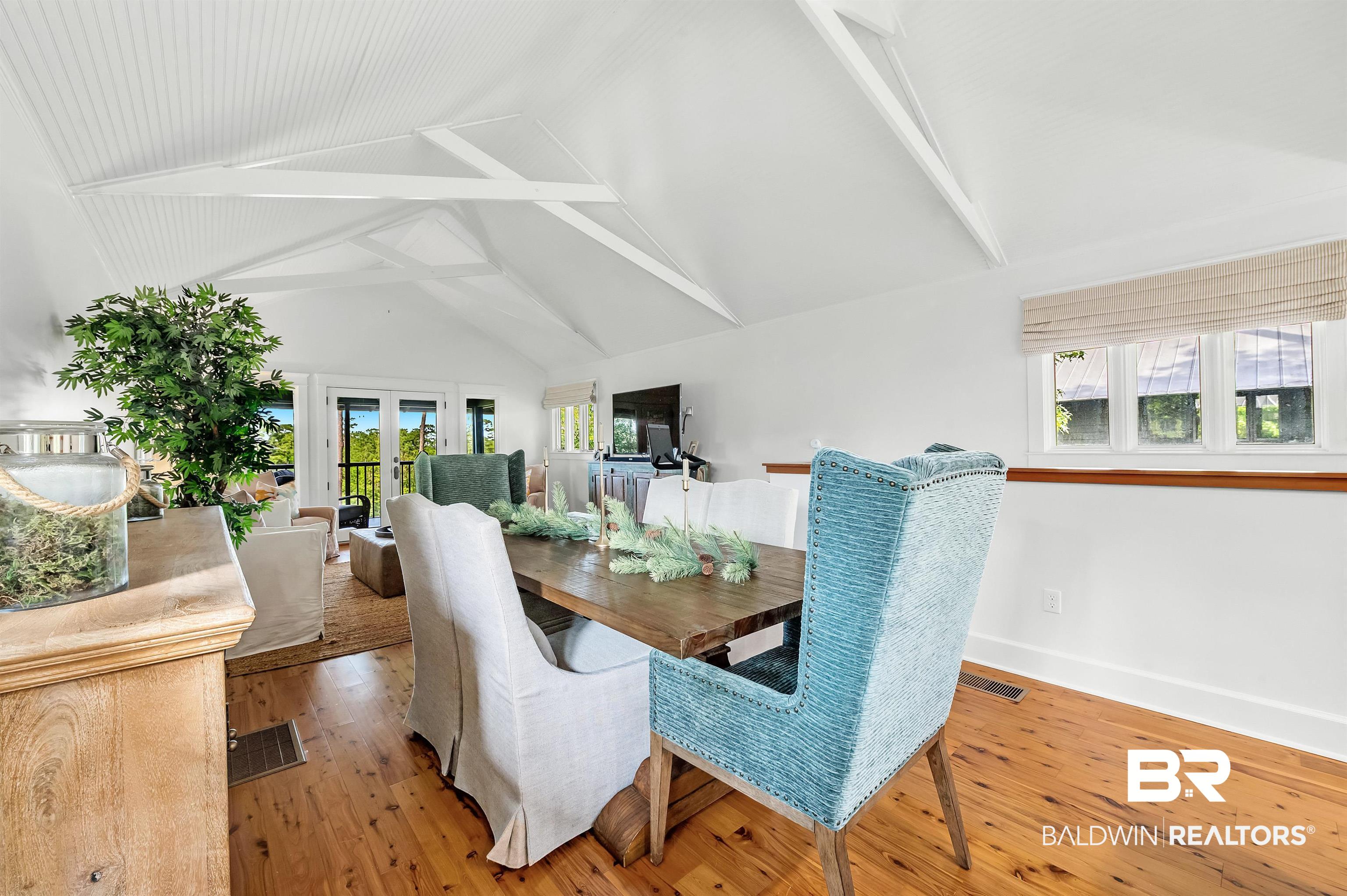 32760 Steelwood Ridge Road, Unit 7 Loxley, AL 36551 - Photo 24 of 64 Dining space featuring french doors, light wood finished floors, high vaulted ceiling, beamed ceiling, and baseboards