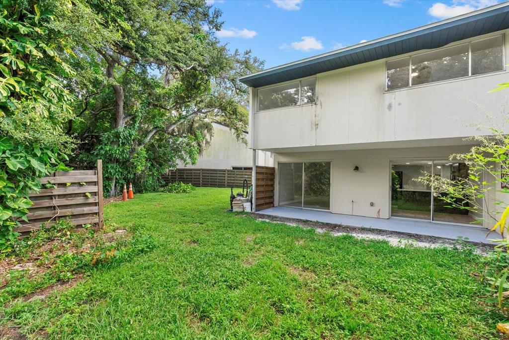 1125 Longfellow Way Sarasota, FL 34243 - Photo 28 of 43 a view of a house with a backyard