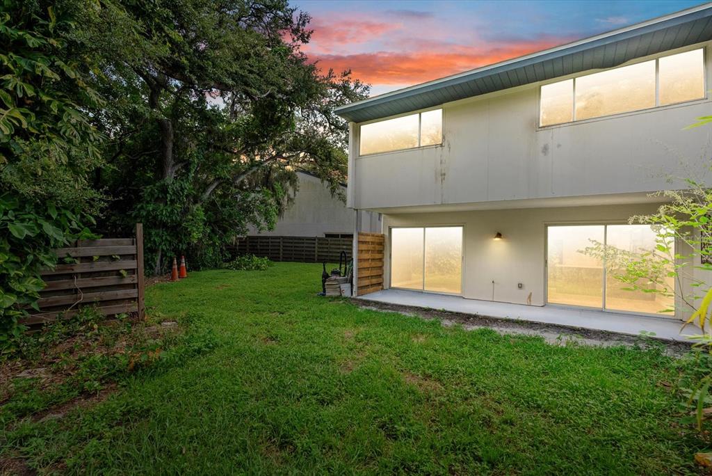 1125 Longfellow Way Sarasota, FL 34243 - Photo 29 of 43 a backyard of a house with lots of green space