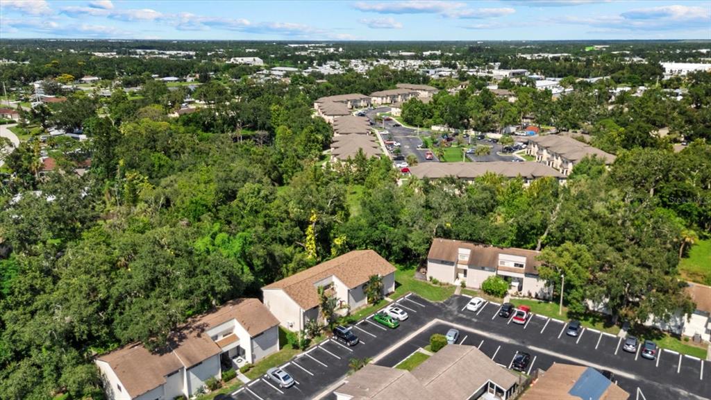 1125 Longfellow Way Sarasota, FL 34243 - Photo 33 of 43 an aerial view of a house with a yard