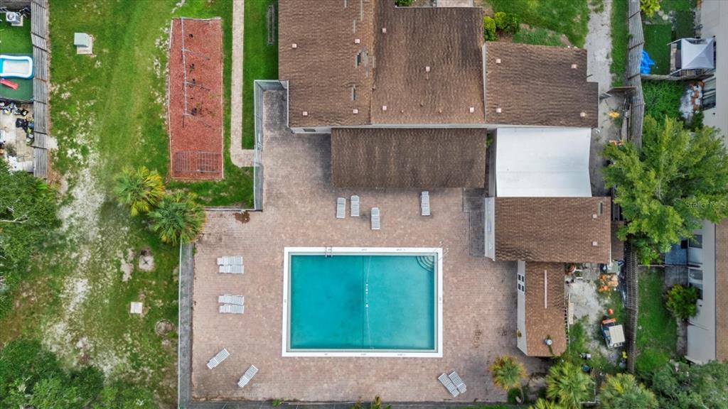 1125 Longfellow Way Sarasota, FL 34243 - Photo 37 of 43 an aerial view of a house with a yard and a garage