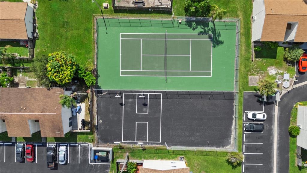 1125 Longfellow Way Sarasota, FL 34243 - Photo 40 of 43 a green field with some trees in front of it