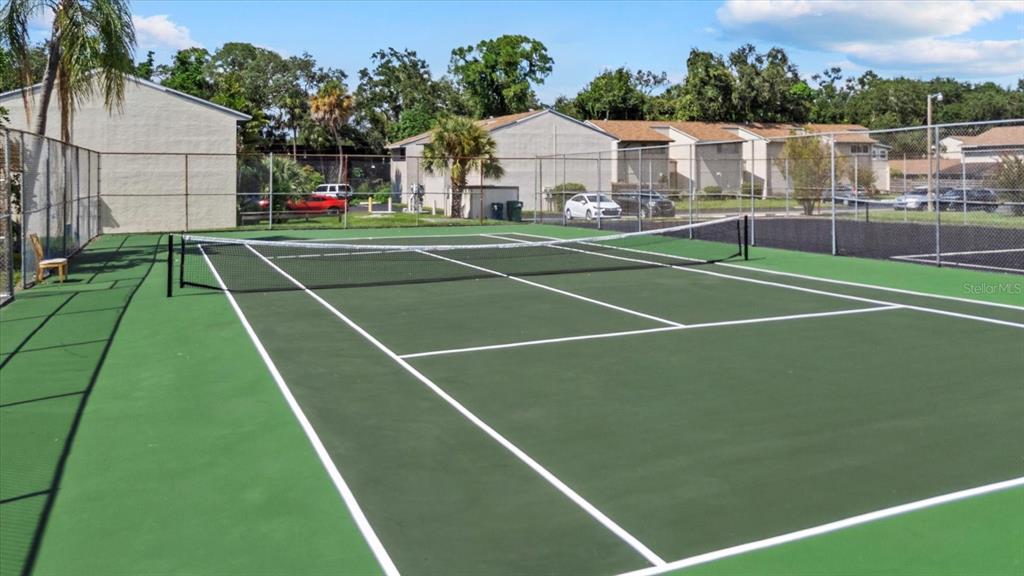 1125 Longfellow Way Sarasota, FL 34243 - Photo 42 of 43 a view of a tennis court