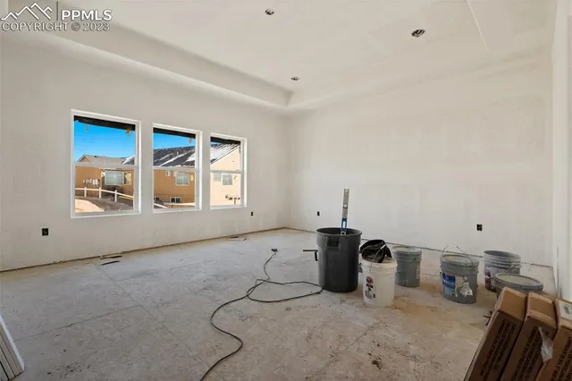a view of a storage & utility room with two washing machine