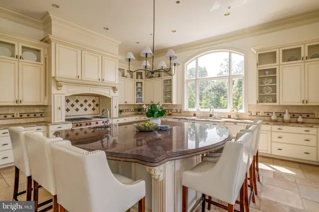 a view of a dining room with furniture and window