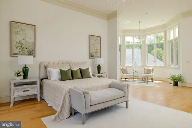 a bedroom with a bed and a fireplace