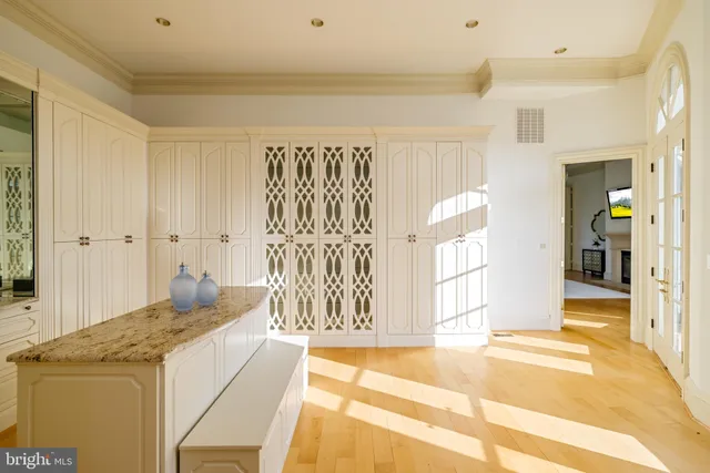 a large white tub sitting in a bathroom