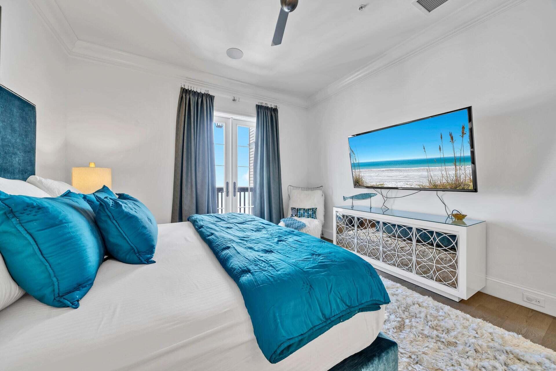 74 Town Hall Road, Unit 3A Rosemary Beach, FL 32461 - Photo 28 of 56 a bedroom with a bed and a flat screen tv