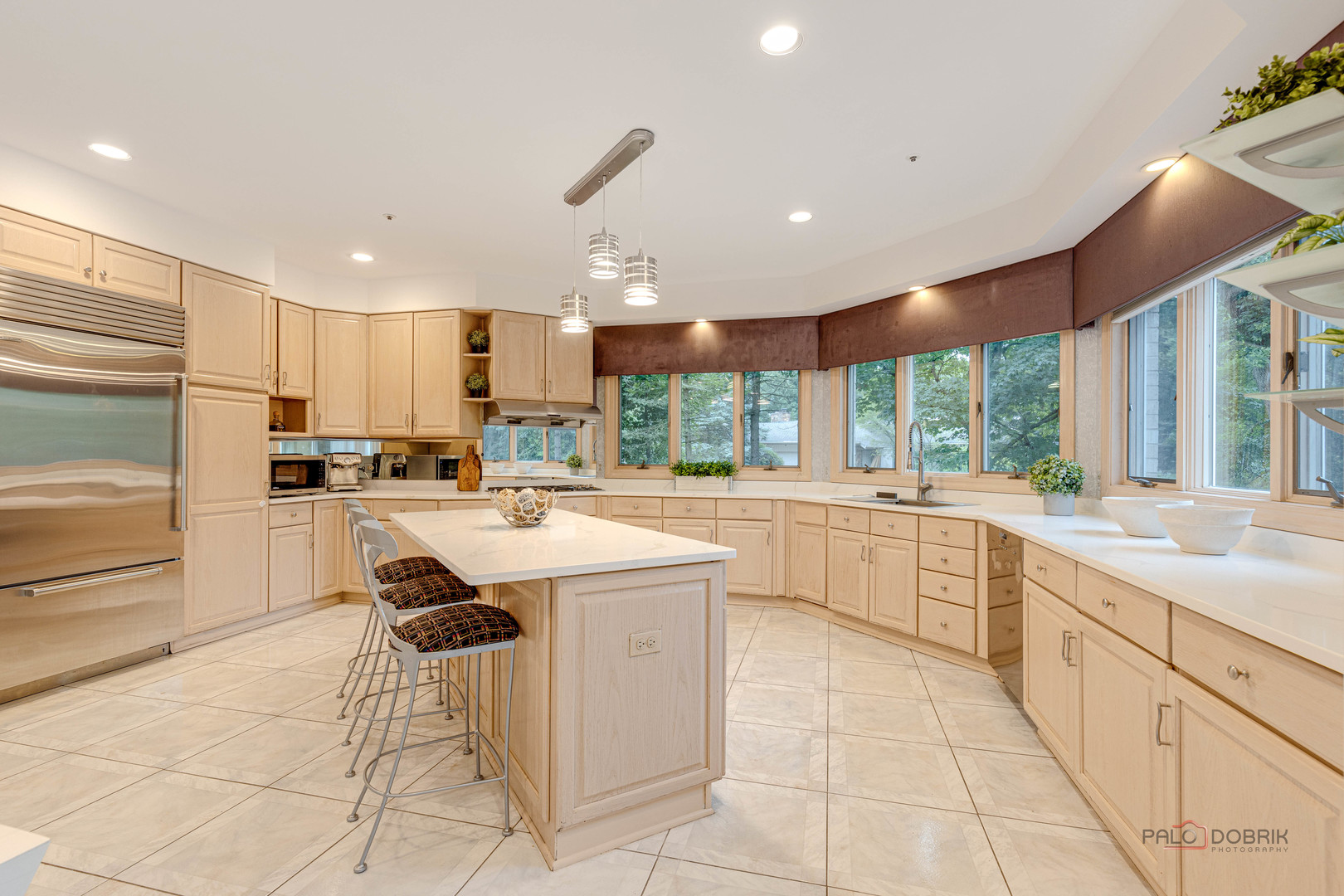 2329 Coach Road Long Grove, IL 60047 - Photo 15 of 56 a kitchen with counter top space appliances and windows