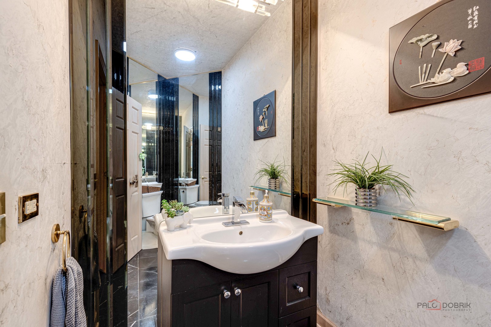 2329 Coach Road Long Grove, IL 60047 - Photo 17 of 56 a bathroom with a sink a mirror and a shower
