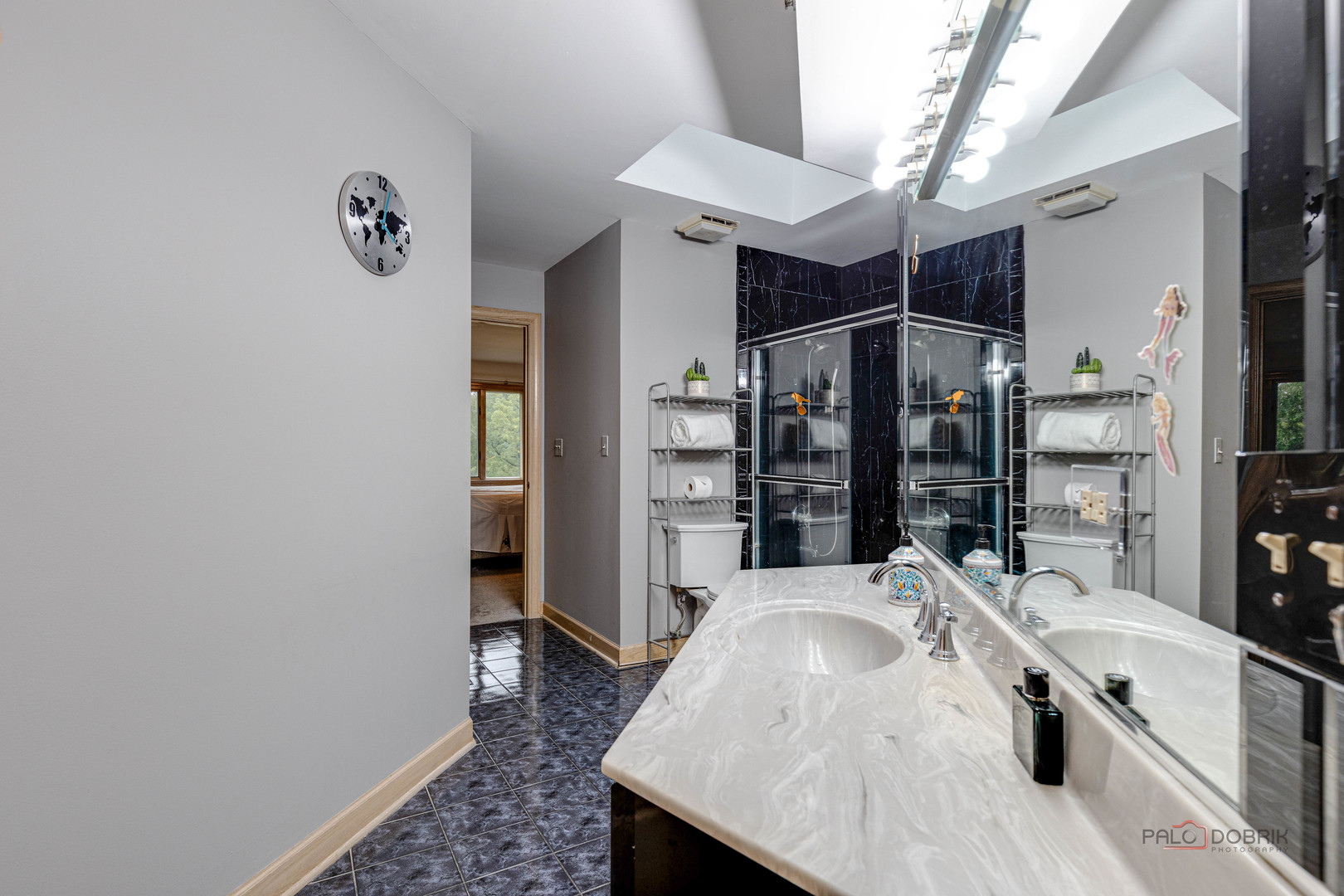 2329 Coach Road Long Grove, IL 60047 - Photo 19 of 56 a large white kitchen with a granite countertop sink and white cabinets