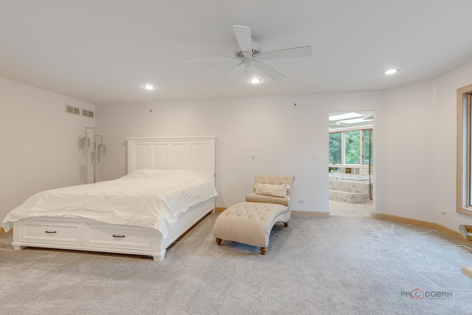 2329 Coach Road Long Grove, IL 60047 - Photo 24 of 56 a spacious bedroom with a bed and a window