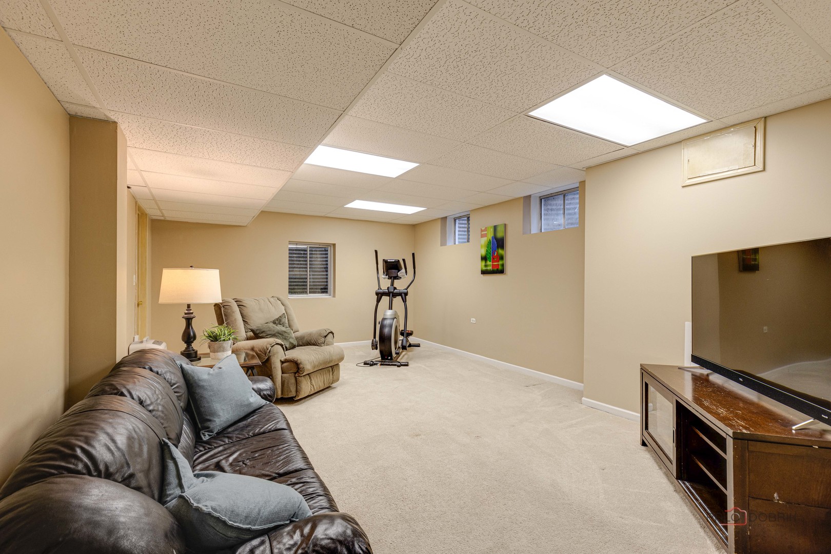 2329 Coach Road Long Grove, IL 60047 - Photo 35 of 56 a living room with furniture and a flat screen tv
