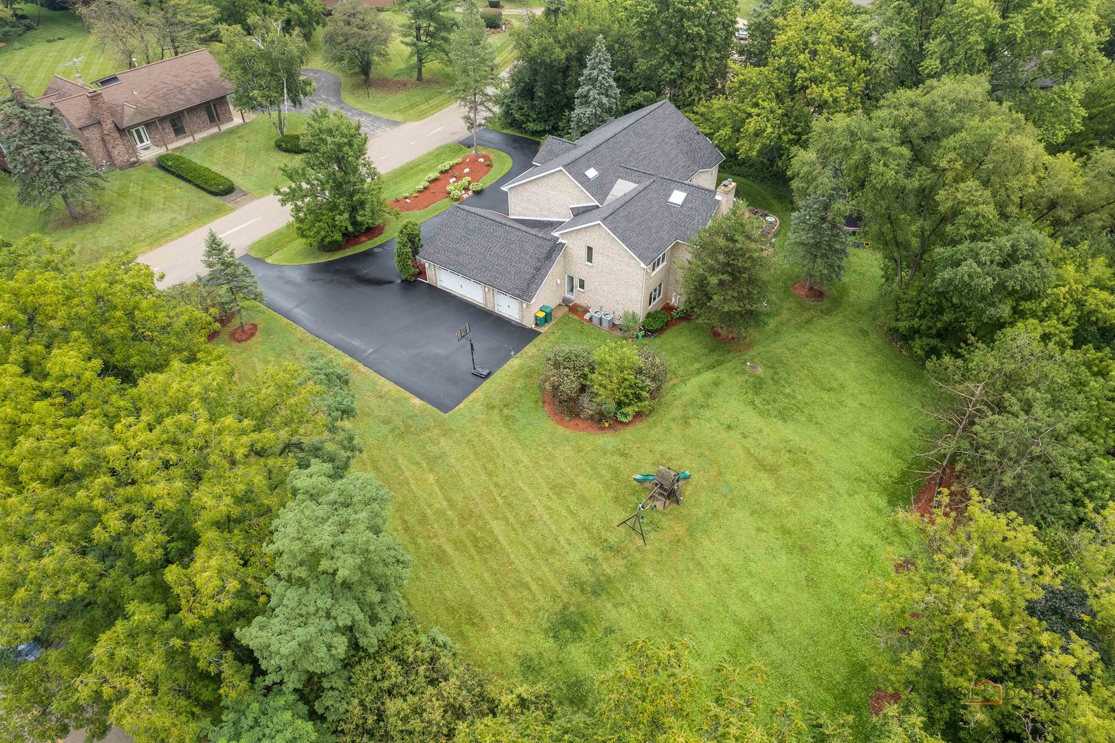 2329 Coach Road Long Grove, IL 60047 - Photo 45 of 56 an aerial view of a house with garden space and street view