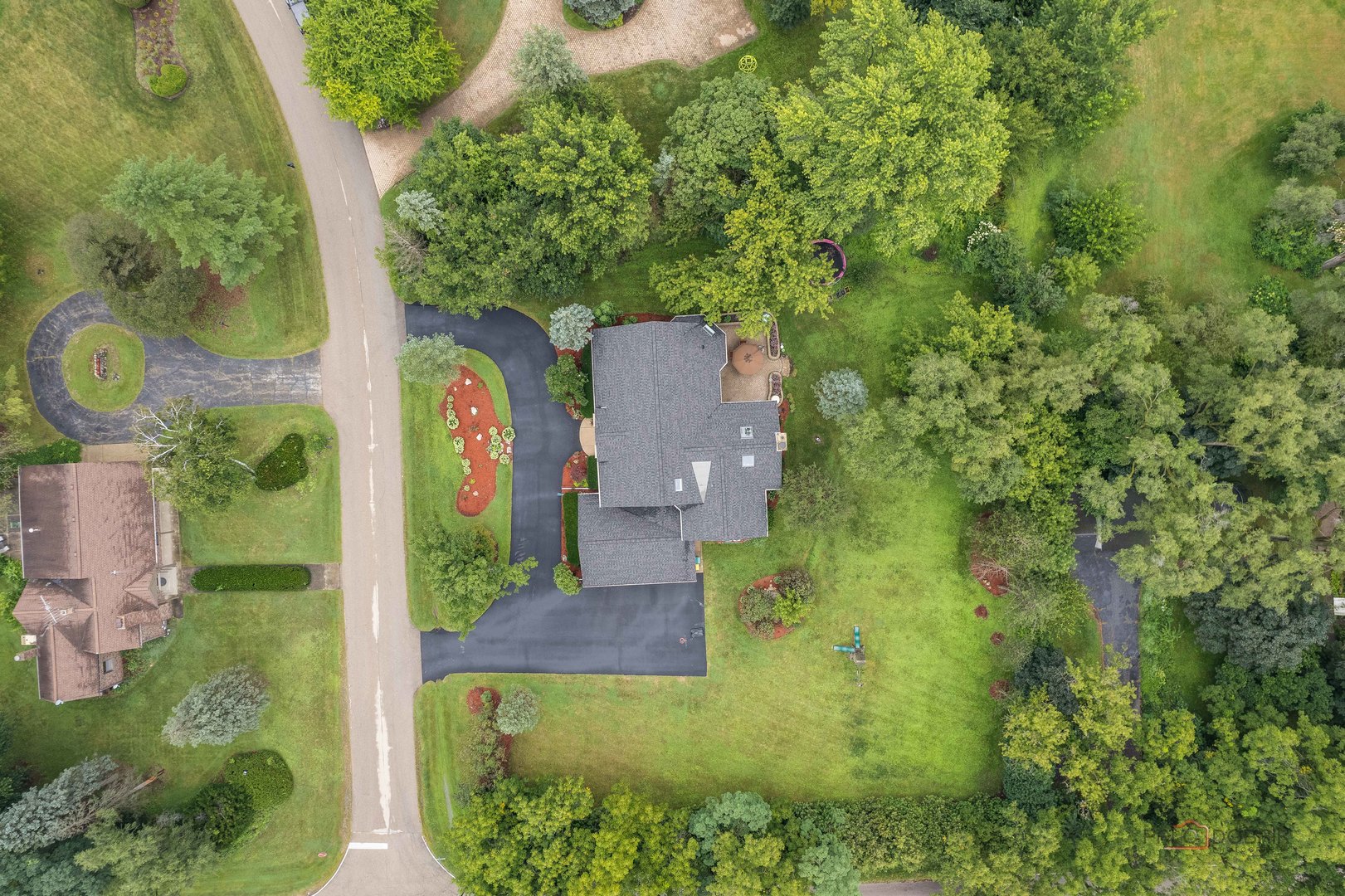 2329 Coach Road Long Grove, IL 60047 - Photo 50 of 56 an aerial view of a house with a yard